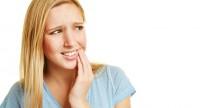 Zgorzel zęba – przyczyny powstania, symptomy, leczenie i powikłania